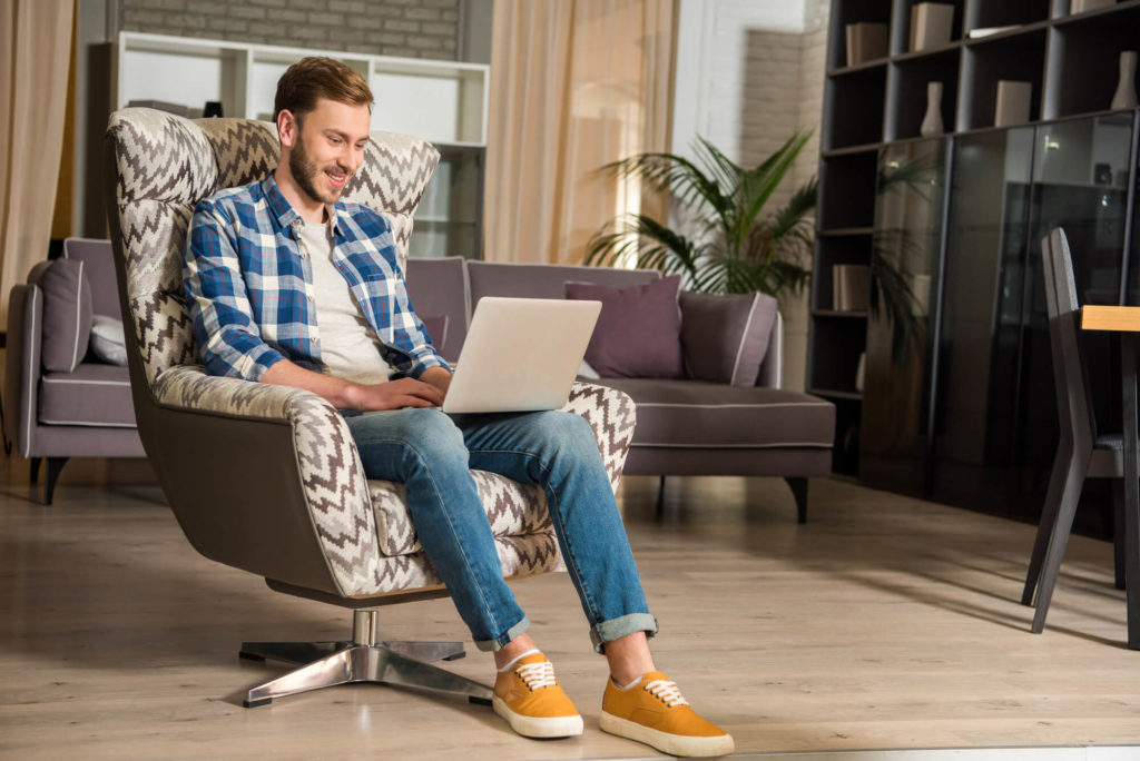 Man on accent chair