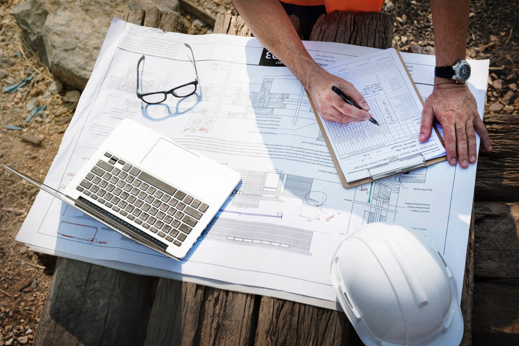 construction engineer working with laptop