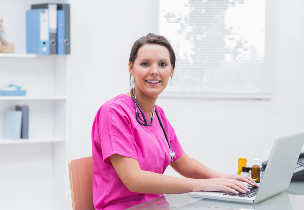 nurse working on laoptop