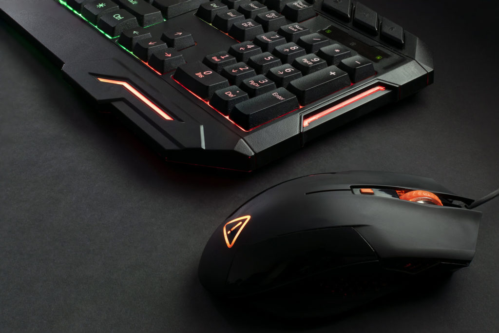 black gaming mouse and keyboard