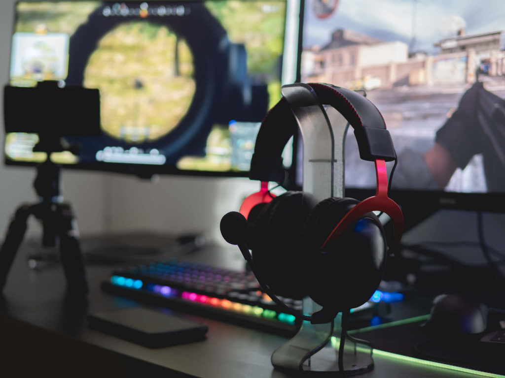 headset standing infront of gaming laptop